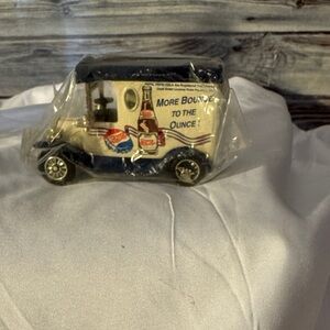 Pepsi Diecast Model Car with Blue and Cream Design